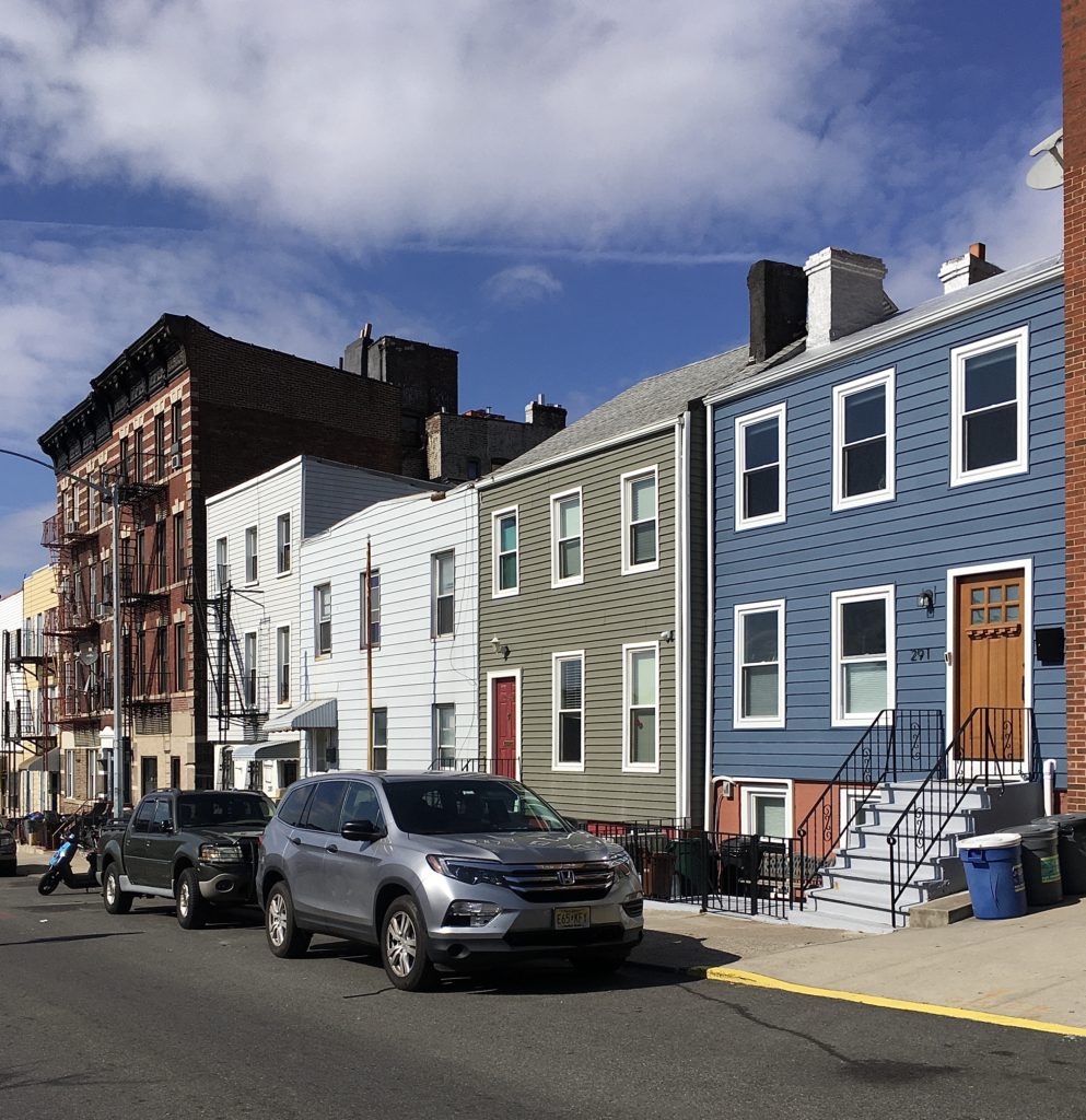The blue house at right, which is 291 23rd St., sold for $1.325 million in 2019. Photo: Lore Croghan/Brooklyn Eagle