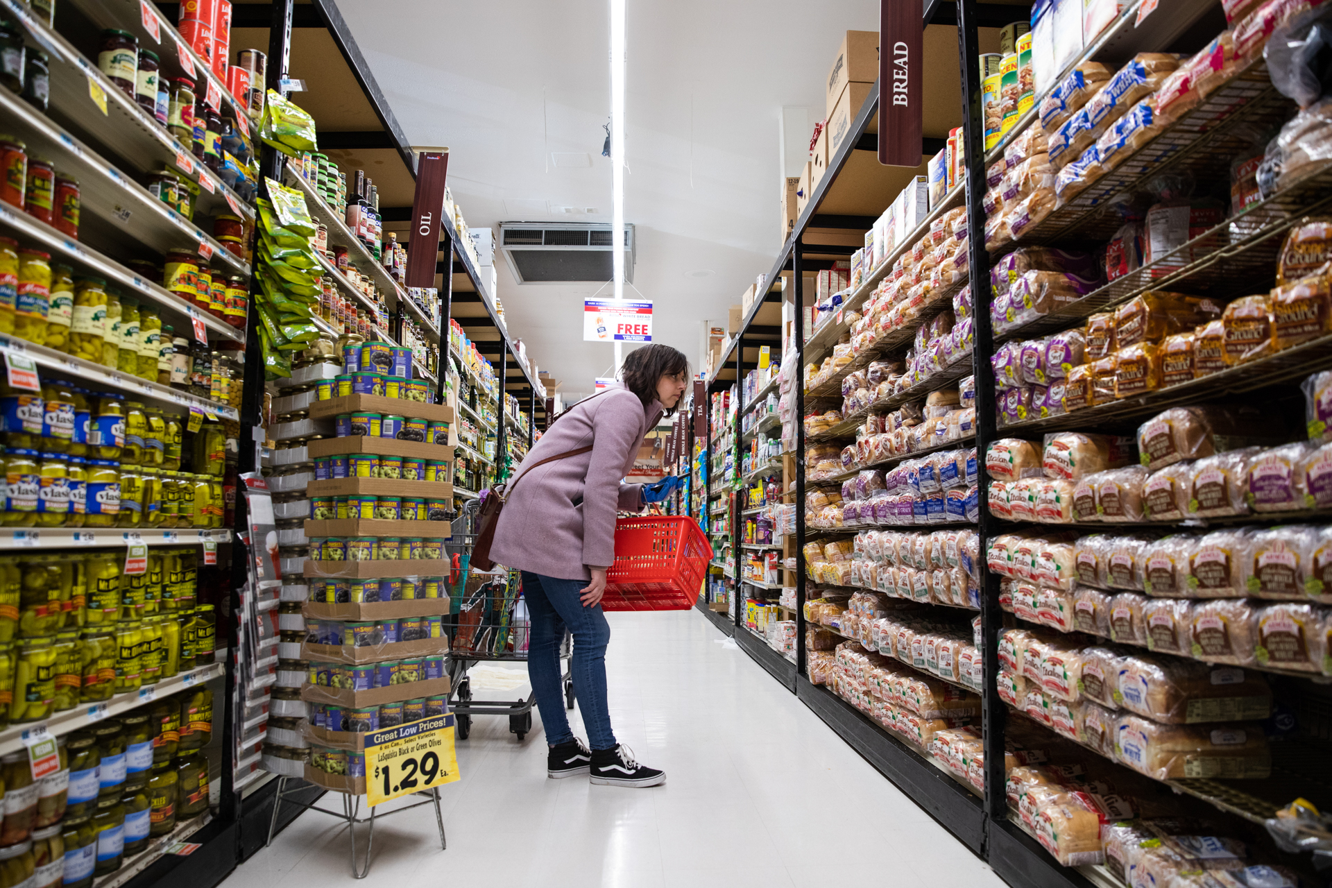 Nicole Mirra searches for the correct brands of foods for her recipients. Photo: Paul Frangipane/Brooklyn Eagle