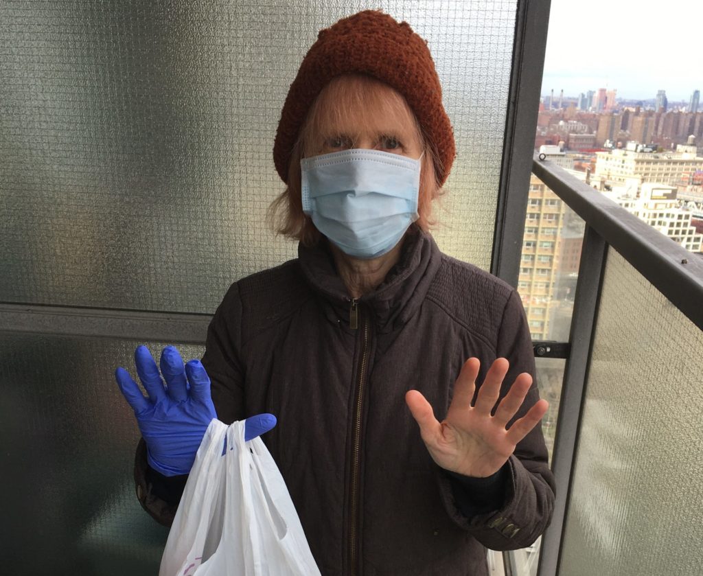 Brooklyn Heights resident Beverly Closs has developed an ingenious “one-glove” system for shopping without actually touching any groceries. Photo: Courtesy of Beverly Closs