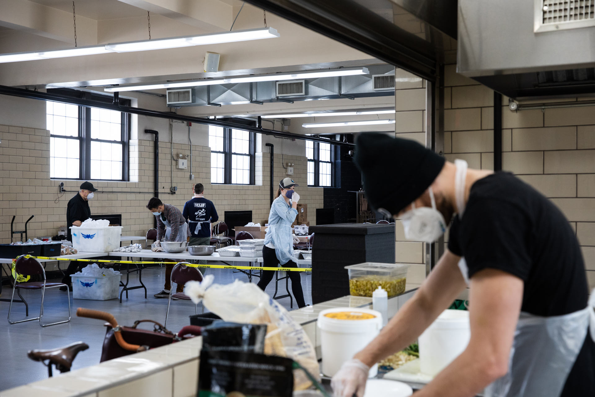 The North Brooklyn Angels work out of Our Lady of Mount Carmel on April 6, 2020. Since the coronavirus pandemic has caused a wave of unemployment, demand for food has increased for the mobile soup kitchen. Photo: Paul Frangipane/Brooklyn Eagle