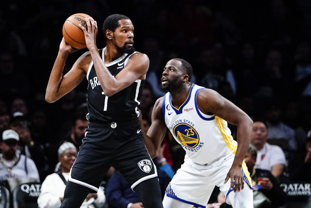 Warriors' Stephen Curry falls to Brooklyn's Joe Harris in 3-point contest