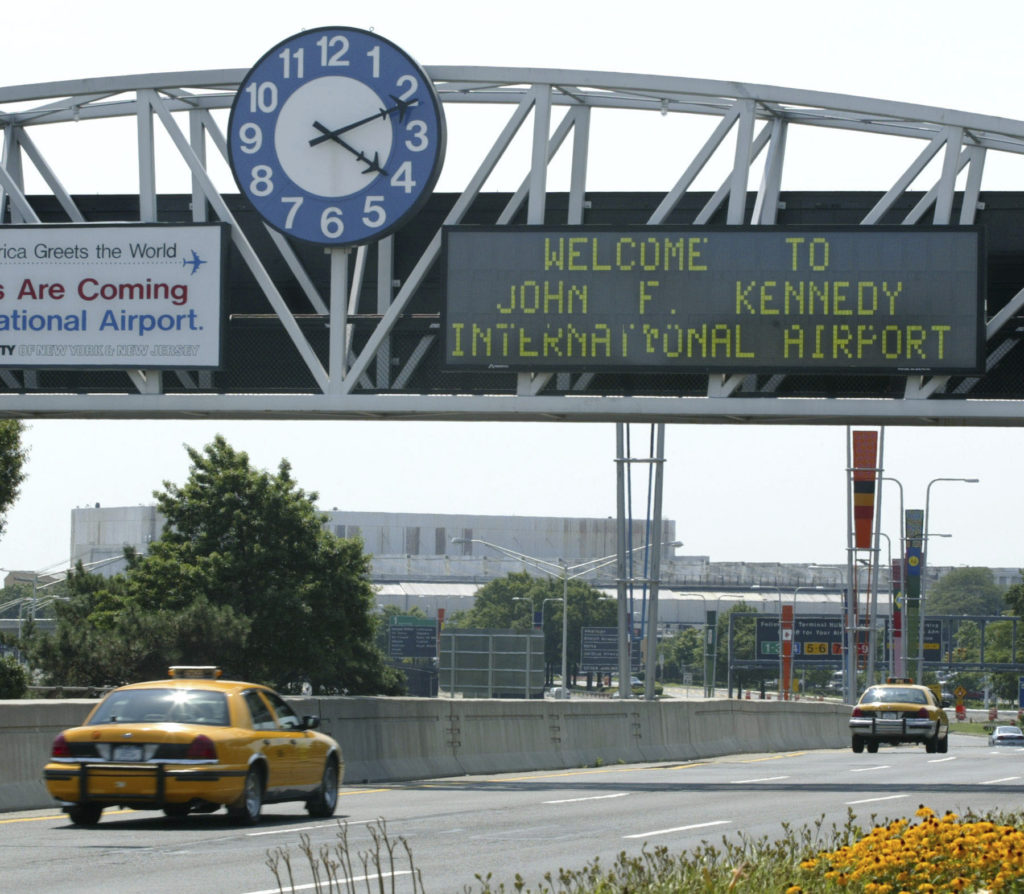 A clock at the entrance to JFK Airport. AP Photo/Stuart Ramson, File