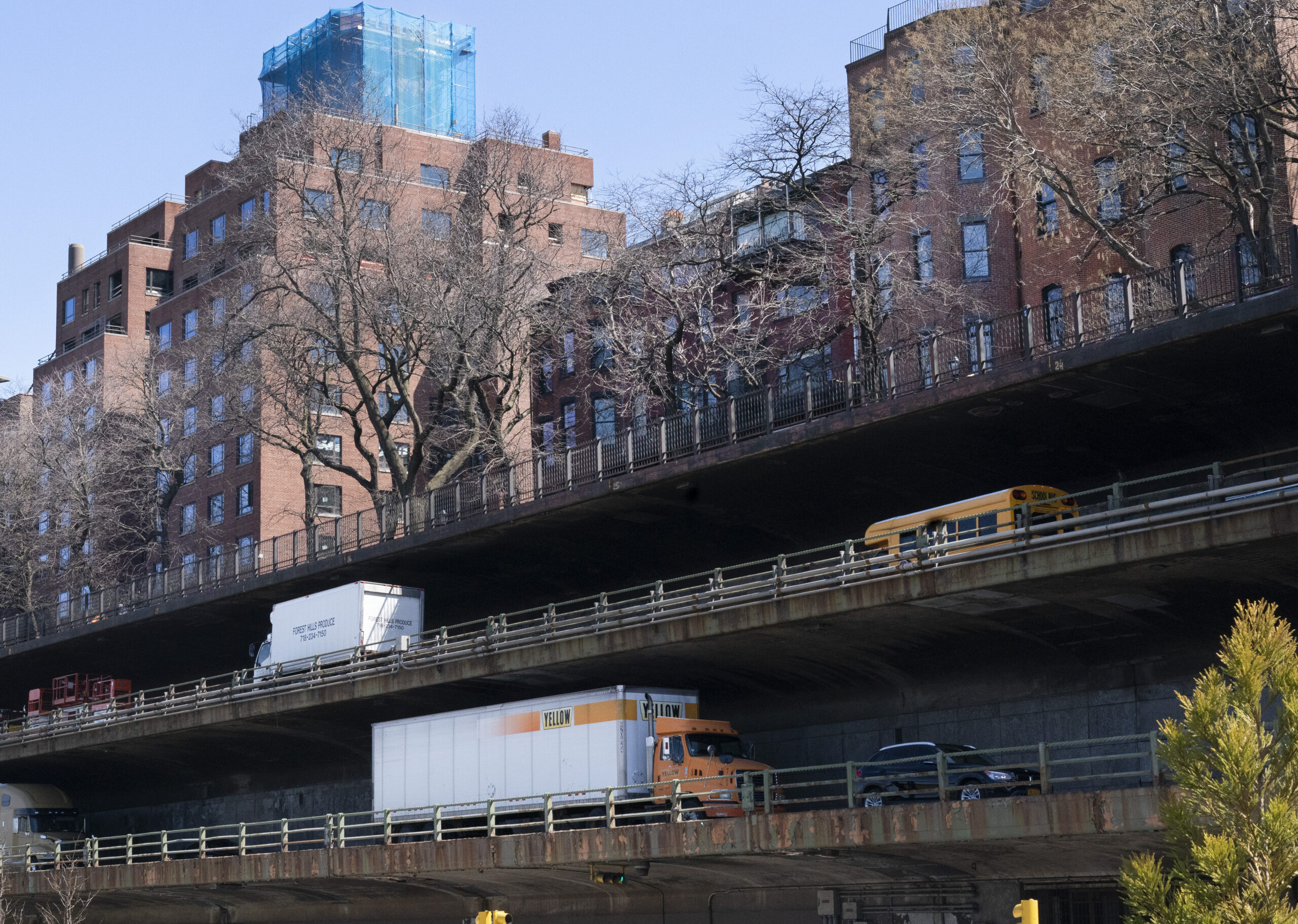 A coalition of a dozen Brooklyn organizations which has been working for years to transform the Central section of the BQE says that the city's redesign plan is based on yesterday's traffic planning. Shown: Vehicles drive along the Brooklyn-Queens Expressway beneath the Brooklyn Heights Promenade, Tuesday, April 6, 2021. 
AP Photo/Mark Lennihan