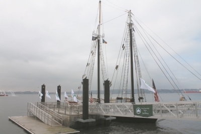 A fireboat saluted the new Eco Dock, where the schooner ship, The Pioneer, was docked.