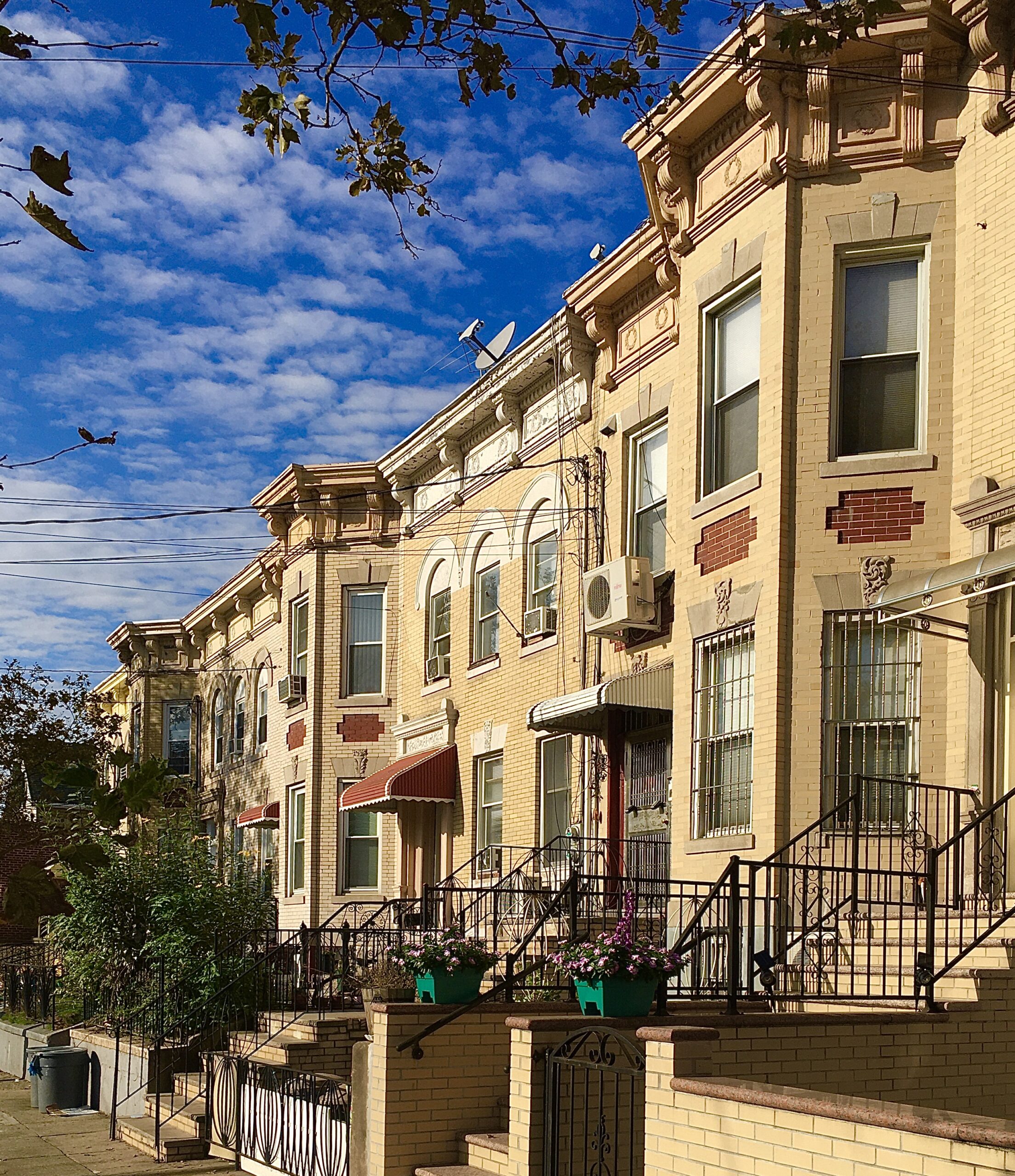 This row of old-fashioned houses can be found on 86th Street in Bensonhurst. Eagle photo by Lore Croghan