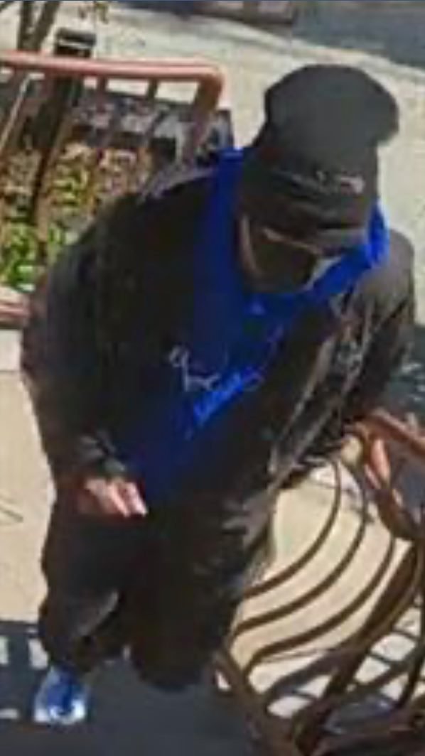 Cops seek suspect for stealing package outside Dyker Heights home