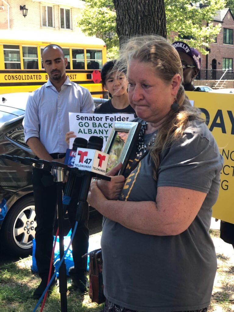 Jane Martin-Lavaud, a member of Families for Safe Streets, held a picture of her 24-year-old daughter Leonora, who was struck and killed on Avenue U five years ago.