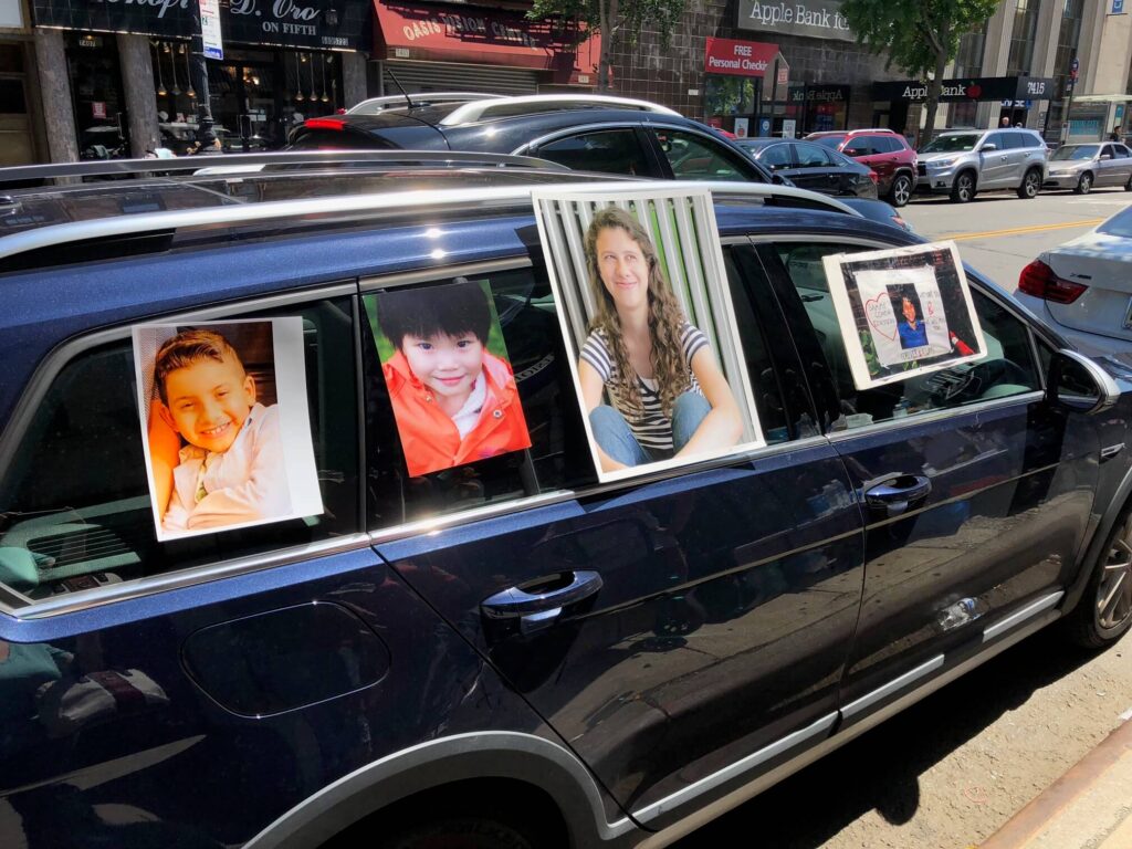 A car parked outside state Sen. Marty Golden’s office displayed photo of young people who were killed by speeding drivers.