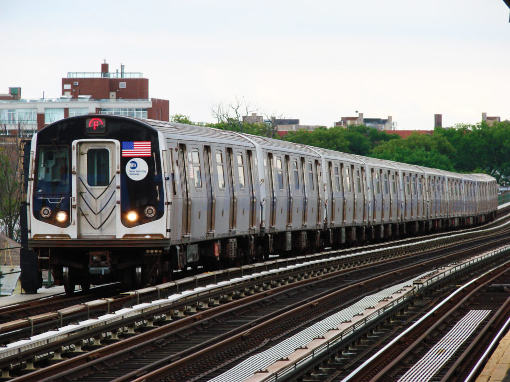 The F train travels over its long elevated stretch south of Church Avenue.