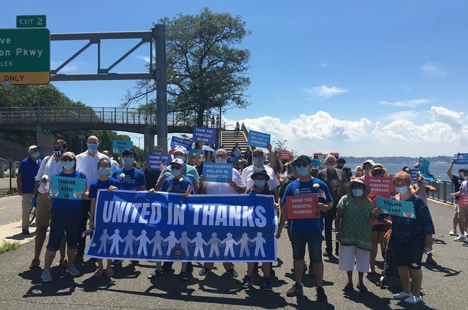 Neighbors march to thank essential workers
