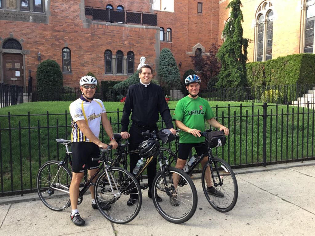 Priest raises 20K for food pantry during 100-mile bike ride