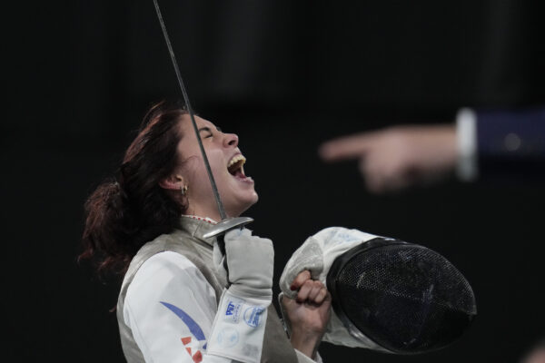 SANTIAGO — Exultation shows more clearly when the foil is removed: Chile's Arantza Inostroza celebrates her victory over Brazil's Ana Di Renzo at the end of a women's foil individual fencing competition at the Pan American Games in Santiago de Chile, Chile, Monday, Oct. 30, 2023.Photo: Matias Delacroix/AP