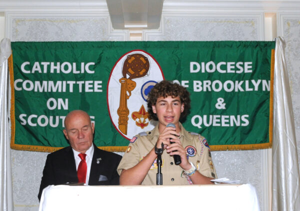 (From left) Brian Long, Diocesan scouting director; and Jake Harmon, Eagle Scout.