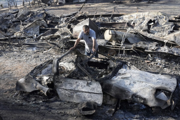 CALIFORNIA — Nature’s revenge — wildfires aftermath turns homes into gray wasteland: Luis Quinonez surveys the damage to his property after the Highland Fire passed through Tuesday, Oct. 31, 2023, in Aguanga, Calif.Photo: Marcio Jose Sanchez/AP