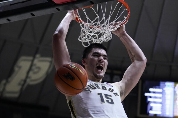 <b>INDIANA — A dunkin’ rush - hangin’ around for the cheers:</b> Purdue center Zach Edey (15) gets a basket on a dunk against Xavier during the second half of an NCAA college basketball game in West Lafayette, Ind., Monday, Nov. 13, 2023. Purdue defeated Xavier 83-71.<br>Photo: Michael Conroy/AP