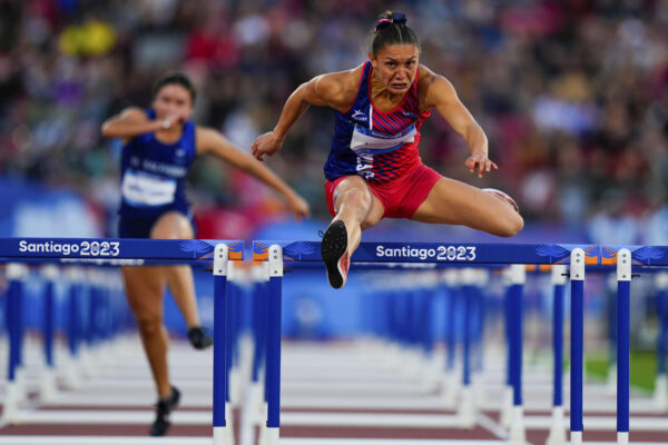 CHILE — Sprinting and the art of hurdle clearance: Costa Rica's Andrea Vargas competes in a women's 100-meter hurdles semifinal at the Pan American Games in Santiago, Chile, Tuesday, Oct. 31, 2023. Photo: Natacha Pisarenko/AP