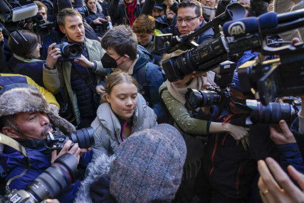 <b>LONDON — Ramifications of a ruckus — it’s about oil:</b> Climate activist Greta Thumberg, center, arrives at the Westminster Magistrates Court, in London, Wednesday, Nov. 15, 2023, where she has to appear, following her charges with a public order offense after she was arrested while taking part in a protest against a conference in London described as “the Oscars of oil.”<br>Photo: Alberto Pezzali/AP