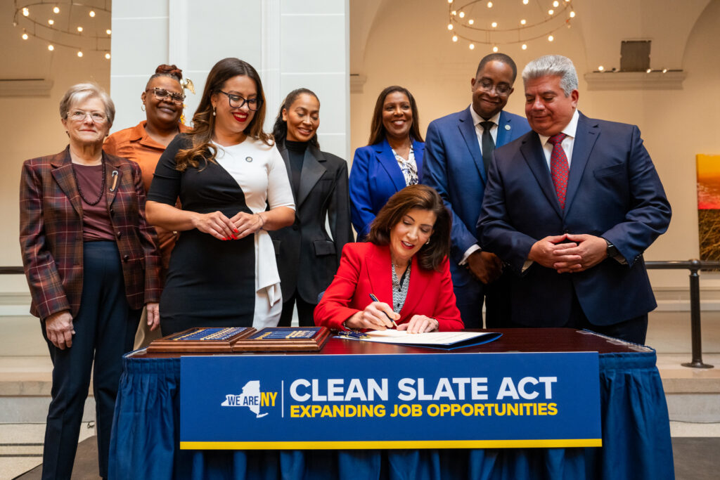 New York Gov. Kathy Hochul signing the Clean Slate Act at the Brooklyn Museum.Photo: Susan Watts/Office of Gov. Kathy Hochul