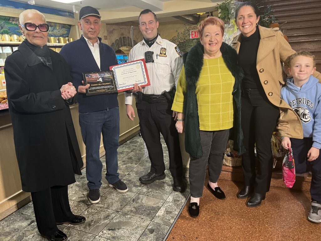 From left: Theresa Scavo, chairperson, Community Board 15; David Isaev, owner and CEO, Cherry Hill Gourmet Market; Capt. Joseph Antonio, commanding officer, 61st Precinct; Raisa Chernina, executive director and founder of Be Proud Inc.; and New York State Sen. Jessica Scarcella-Spanton, 23rd District, with her son, Jack Spanton with the New York State Empire Award.Photos by Wayne Daren Schneiderman