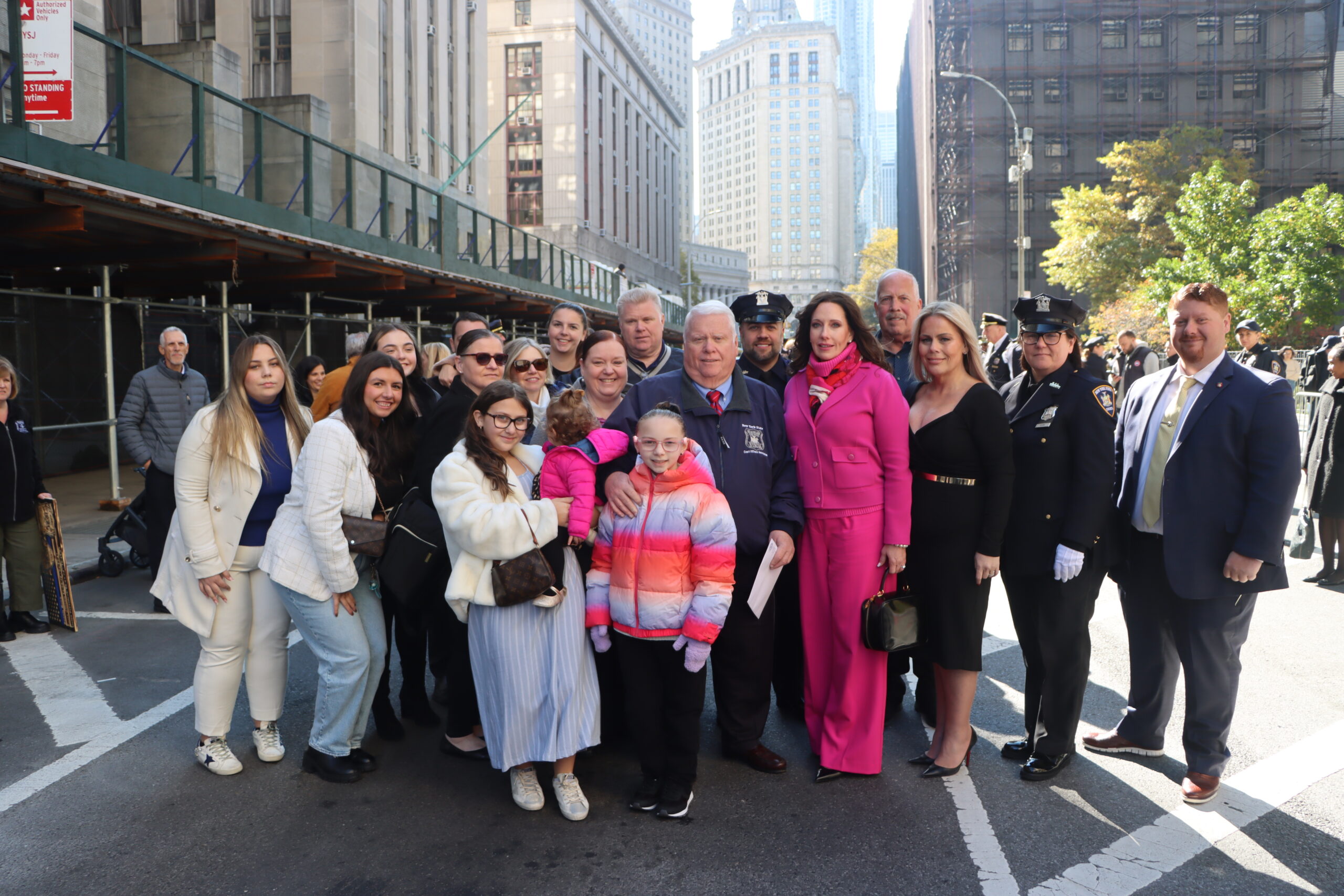 Dennis Quirk, surrounded by his family and close friends, including daughter, Hon. Susan Quirk (third from right), a judge in Kings County Family Court.