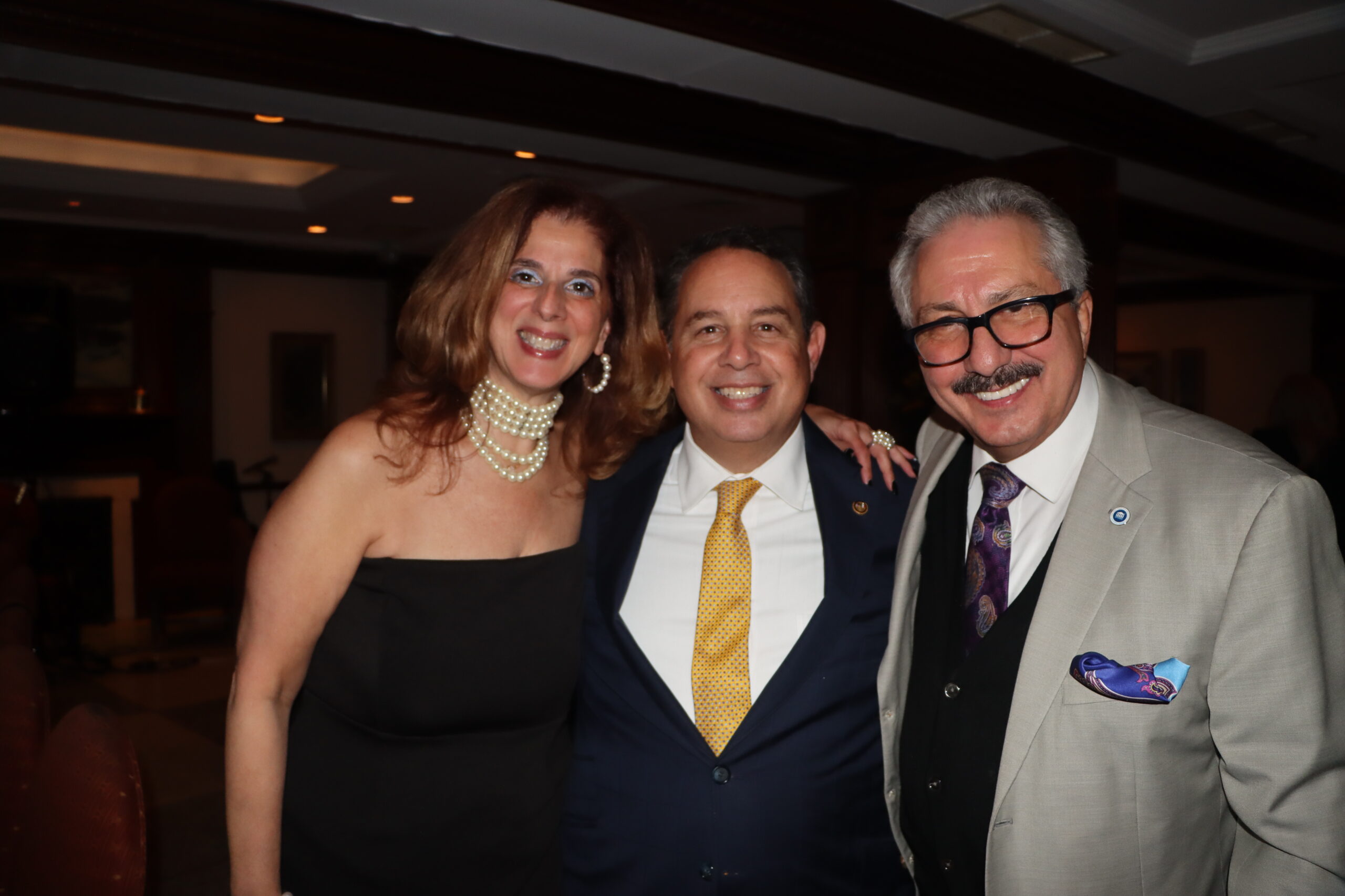 Yolanda Gaudagnoli with Joseph Rosato, president of the Brooklyn Bar Association, and Domenick Napoletano, president-elect of the NYS Bar Association.