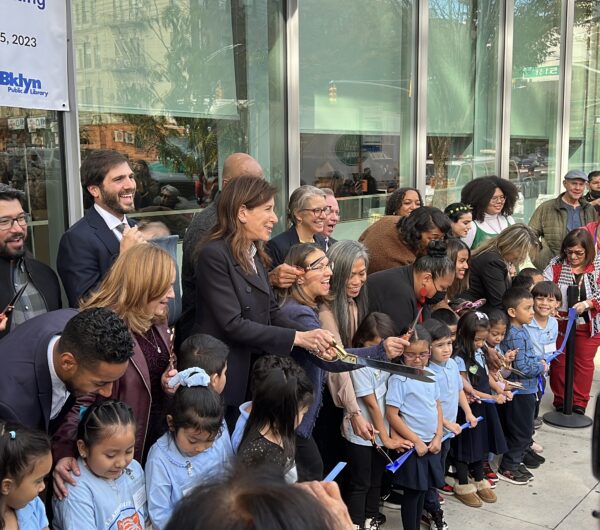 Joined by elected officials, civic leaders and the primary constituents for Sunset Park Library, BPL president Linda Johnson cuts the ribbon opening the new facility.Photo courtesy of BPL
