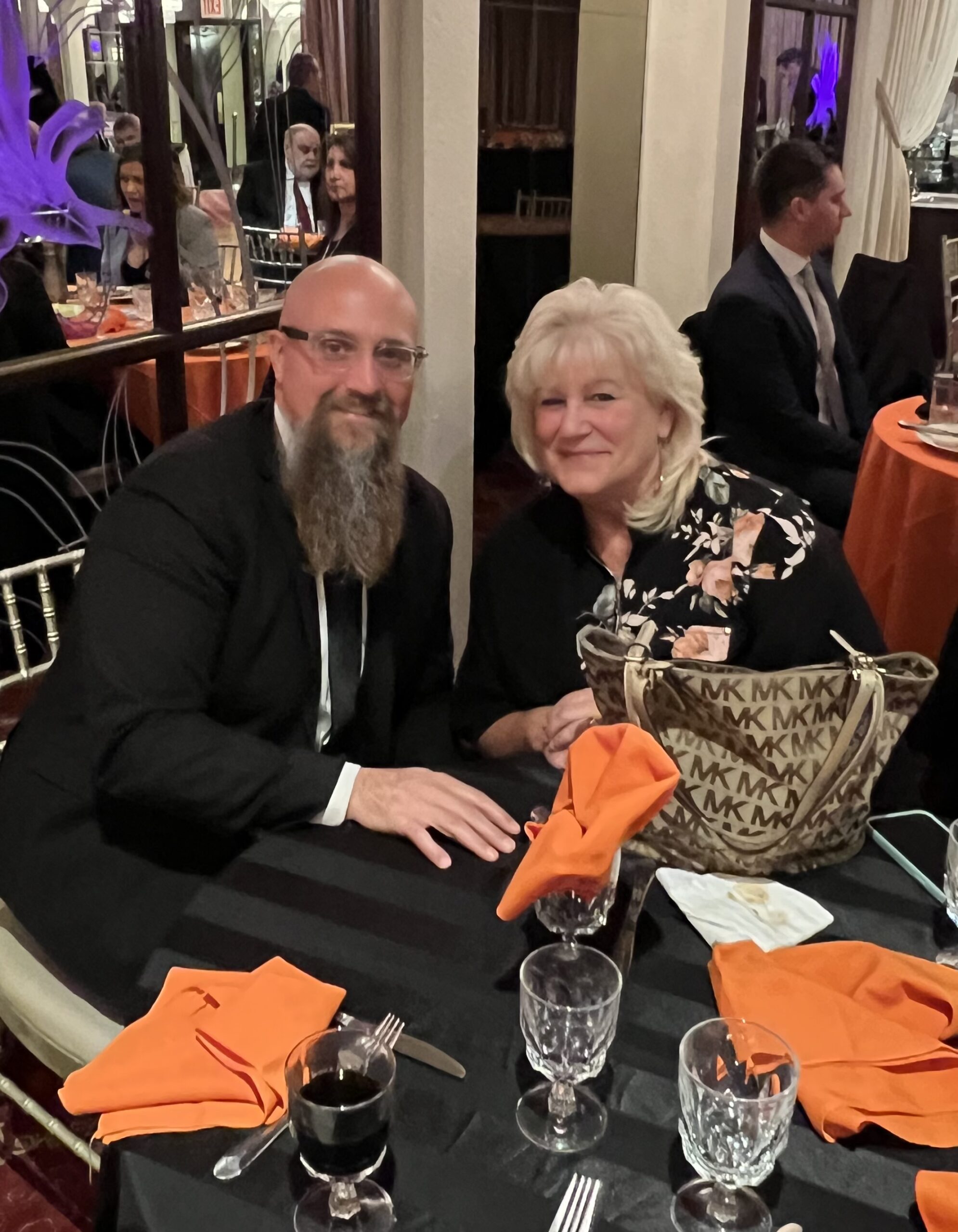 (from left) Attorney Justin Daley; and Arlene Rutuelo, Norwegian Christian Home and Health Center vice chairwoman, Board of Directors at KCCP Annual Reception.