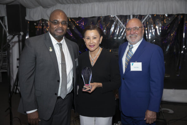 Kendall Charter (left), head of Greenpoint Y, with Congressmember Nydia Velzquez with her Award, and Paul Pullo at October 2023 Greenpoint Y fundraiser. Photo: John McCarten/North Brooklyn Gazette 