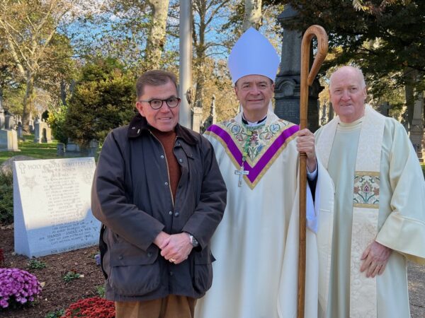 Bishop Robert Brennan is pictured with Michael Cusack (at left) from Bay Ridge, who researched the Medal of Honor recipients, and Monsignor Michael Reid, Chief Operating Officer of Catholic Cemeteries for the Diocese of Brooklyn. Photo: DeSales Media