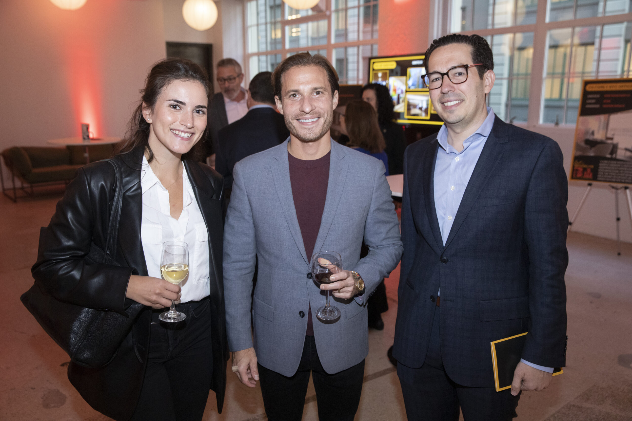 Nicole Serras, Jarad Winter and another guest at Best of Brooklyn Real Estate Showcase.