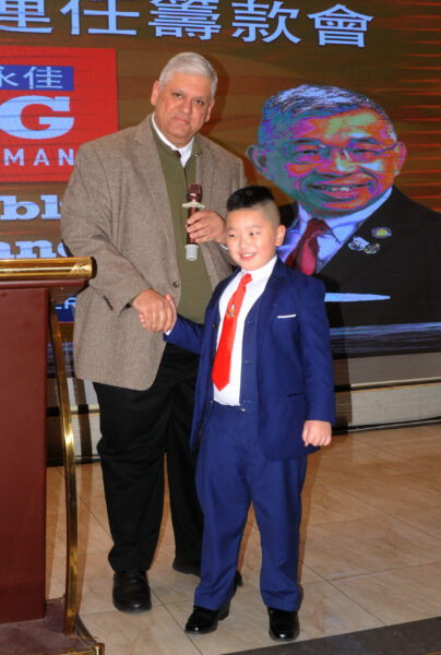 Richie Barsamian, chairman, Kings County Republican Party, and eight-year-old Richard Tang, who Barsamian called “the future of Brooklyn, of New York City, and the United States of America” at Chang Fundraiser. 