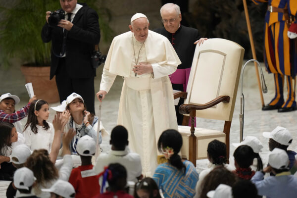 VATICAN — Cultivating new generations in the faith: Pope Francis arrives for an audience with children from all over the world in the Paul VI Hall at The Vatican, on Monday, Nov. 6, 2023. Photo: Alessandra Tarantino/AP
