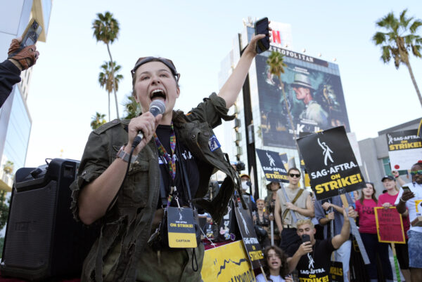 <b>LOS ANGELES — Both exposure and feelings run high in this long strike:</b> SAG-AFTRA captain Mary M. Flynn rallies fellow striking actors on a picket line outside Netflix studios, Wednesday, Nov. 8, 2023, in Los Angeles.<br>Photo: Chris Pizzello/AP