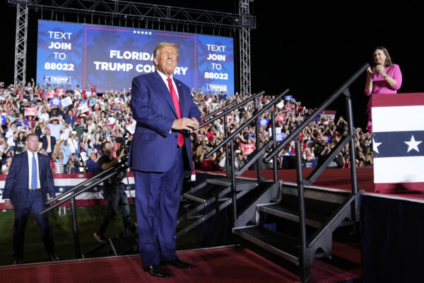 <b>FLORIDA — From fraud trial to FLA rally:</b> Former President Donald Trump arrives to speak at a campaign rally in Hialeah, Fla., Wednesday, Nov. 8, 2023. Arkansas Gov. Sarah Huckabee Sanders, stands right.<br>Photo: Lynne Sladky/AP