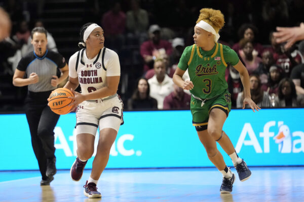 <strong>PARIS — Tough dance moves on a hard floor:</strong> South Carolina guard Te-Hina Paopao (0) is guarded by Notre Dame guard Hannah Hidalgo (3) during the first half of an NCAA college basketball game Monday, Nov. 6, 2023, in Paris.<br>Photo: Thibault Camus/AP
