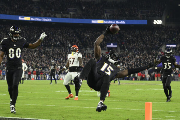 <b>BALTIMORE — ‘This is how you do it, catch the football and then dive feet first into the end zone’:</b> Baltimore Ravens wide receiver Nelson Agholor (15) scores a touchdown in the first half of an NFL football game against the Cincinnati Bengals in Baltimore, Thursday, Nov. 16, 2023.<br>Photo: Nick Wass/AP