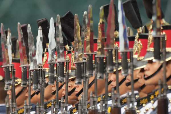 <b>QUEZON CITY — Eyes forward, sabres up:</b> Philippines' troops stand at attention during the 88th anniversary of the Armed Forces of the Philippines at Camp Aguinaldo military headquarters in Quezon City, Philippines on Thursday, Dec. 21, 2023.<br>Photo: Aaron Favila/AP
