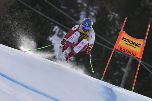 <b>ITALY — The power of a high-speed tuck:</b> Austria's Marco Schwarz speeds down the course during an alpine ski, men's World Cup downhill race, in Bormio, Italy, Thursday, Dec. 28, 2023.<br>Photo: Marco Trovati/AP