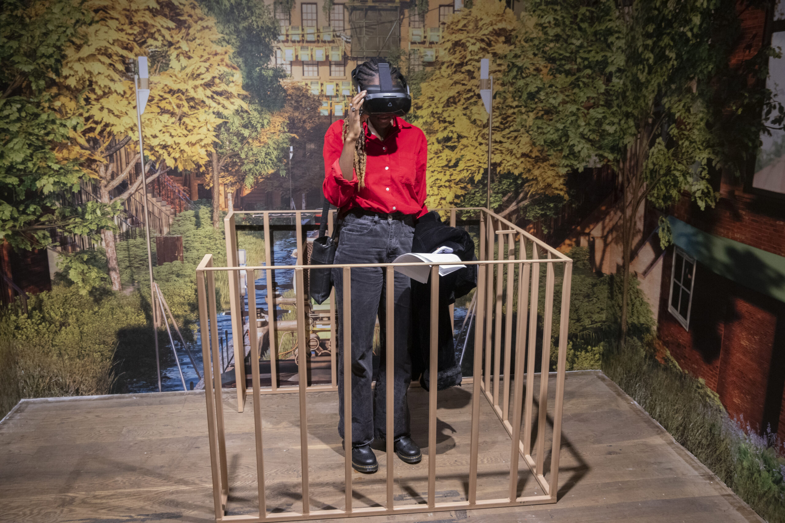Adedoyin Olagbegi takes part in the VR portion of the exhibit at Climate Futurism panel.