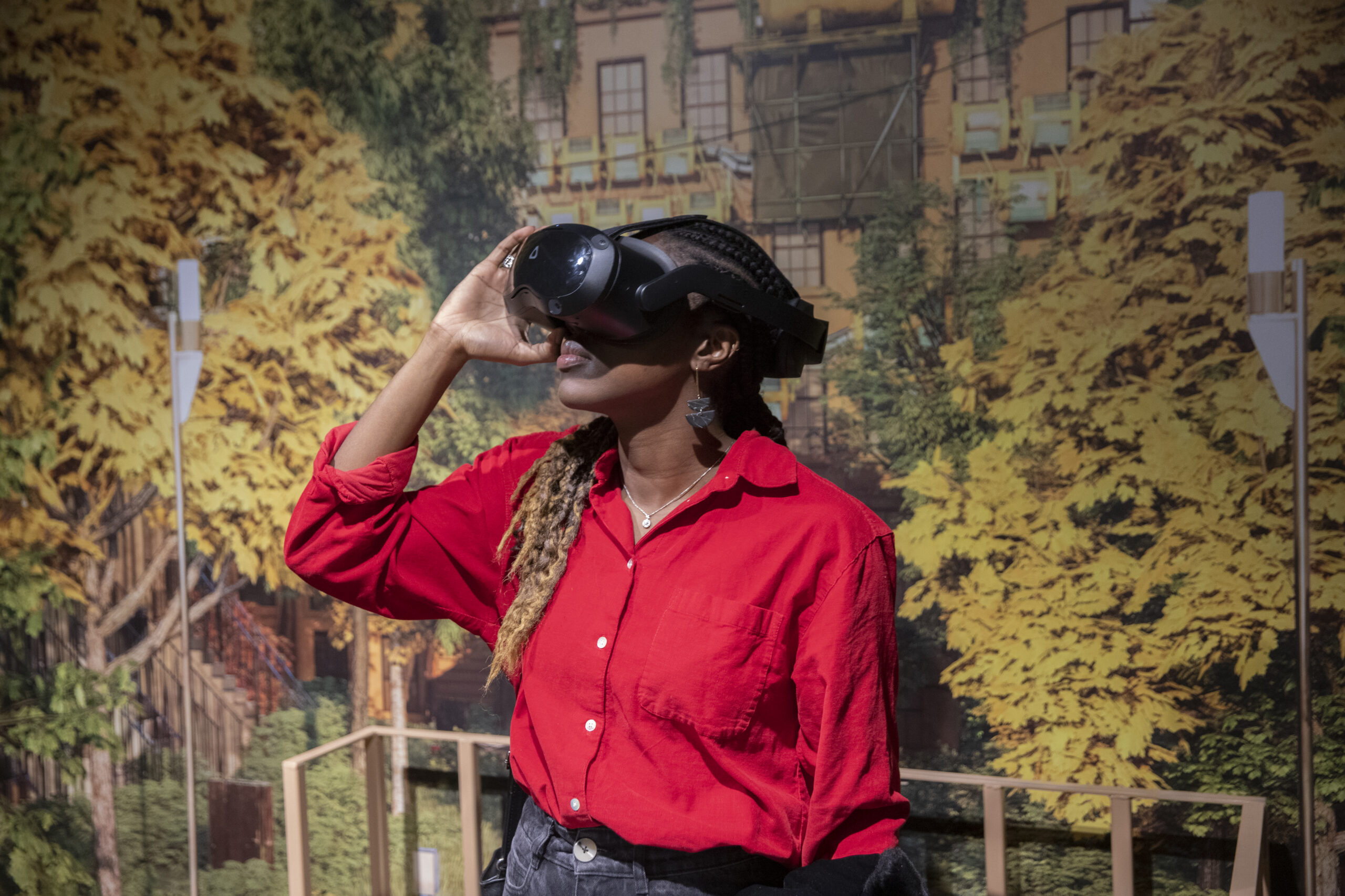 Adedoyin Olagbegi takes part in the VR portion of the exhibit at Climate Futurism panel.