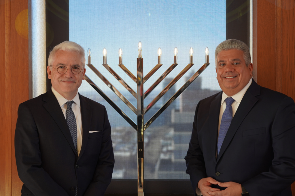 Brooklyn District Attorney Eric Gonzalez (right) and Brooklyn Law School Dean and President David Meyer (left) stand together at the annual Hanukkah celebration held at Brooklyn Law School. The gathering, graced by notable community leaders, highlighted the collaboration between the DA’s Office and educational institutions in promoting cultural awareness and community engagement during the festive season.Photos courtesy of the Brooklyn DA’s Office