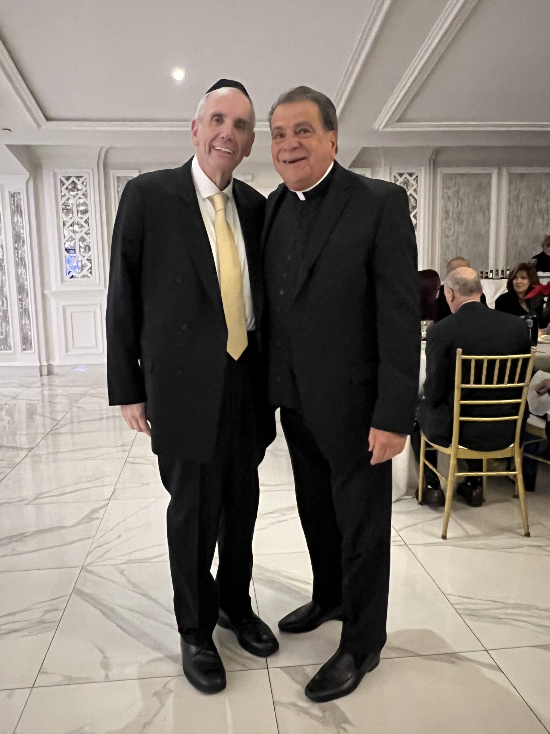 From left: Douglas Jablon, special assistant to the president at Maimonides; and Msgr. David Cassato, Maimonides trustee and vicar for education, Diocese of Brooklyn at eighth annual Community for Kids Benefit.