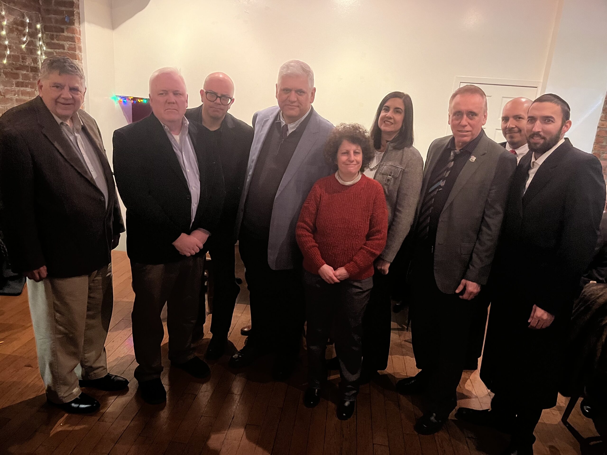 From left: Jerry Kassar, chair, New York State Conservative Party; David Ryan, vice chair, Kings County Conservative Party; David Curcio, chair, Staten Island Conservative Party; Richie Barsamian, chair, Kings County Republican Party; Fran Vella-Marrone, chair, Kings County Conservative Party; U.S. Rep. Nicole Malliotakis, R-11th; John Petrullo, from Police Organization Providing Peer Assistance (POPPA); Detective Luis Lopez (POPPA), and Assemblyman Simcha Eichenstein, D-48th.Photos: Wayne Schneiderman/Brooklyn Reporter