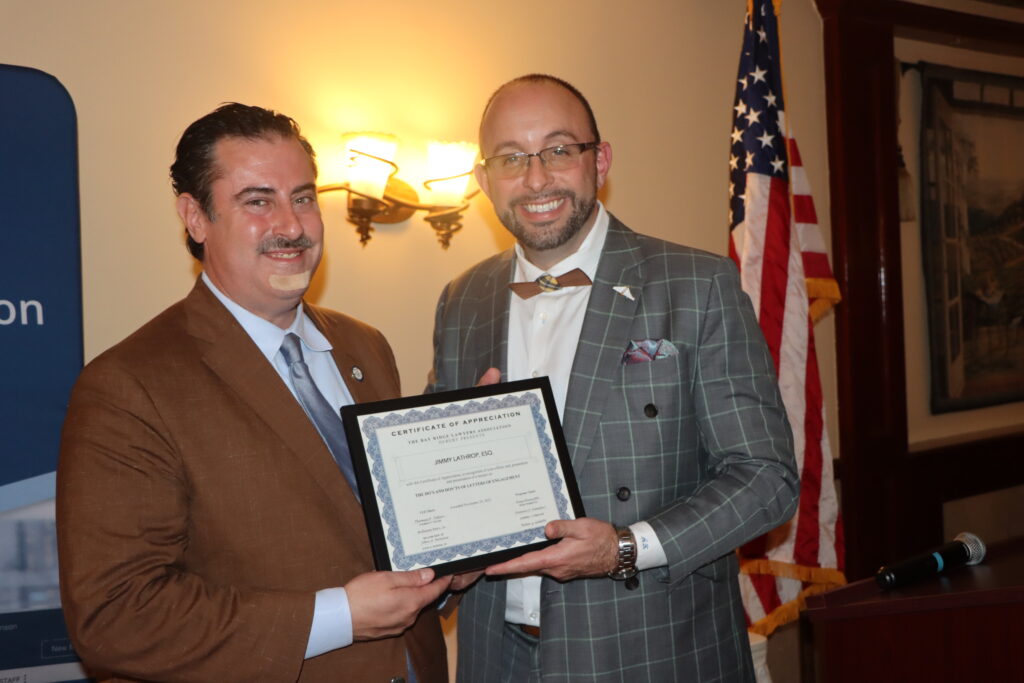 Bay Ridge Lawyers President Adam Kalish (right) presents Jimmy Lathrop with a certificate of appreciation for lecturing on "The Do's and Don'ts of Letters of Engagement” at a recent meeting.Photos: Mario Belluomo/Brooklyn Eagle