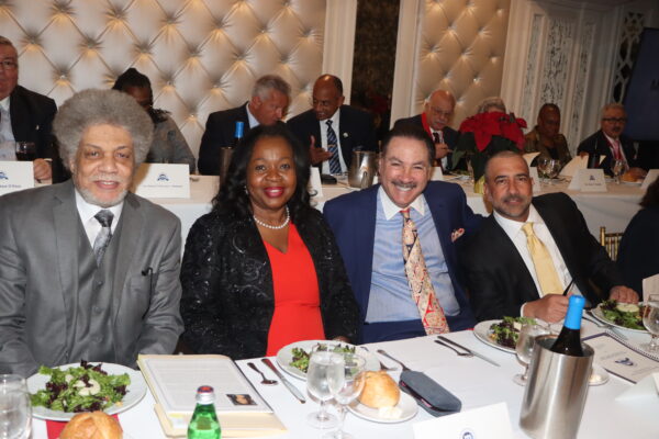The honorees take their place on the dais. Pictured from left to right: Hon. Paul Wooten, Hon. Sylvia Hinds-Radix, Howard Fensterman and Frank Carone at BBA Annual Dinner.