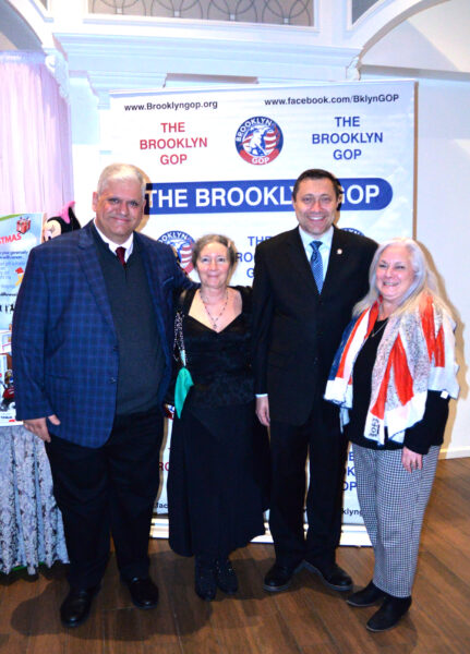 From left: Richie Barsamian, chairman, Kings County Republican Party;
Councilman Ari Kagan; and GOP party guests at GOP holiday party.