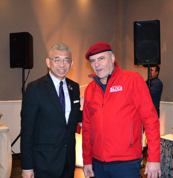 From left: Lester Chang, assemblyman, 49th District (representing Bath
Beach, Bensonhurst, Borough Park, and Dyker Heights); and founder and chief executive officer of the Guardian Angels, Curtis Sliwa at GOP holiday party.