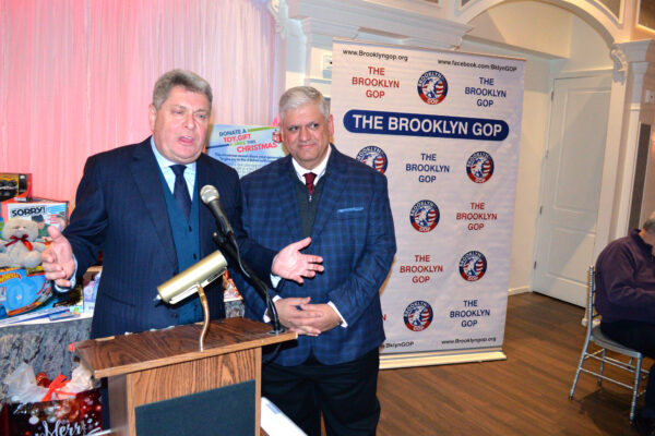From left: Alec Brook-Krasny, assemblyman, 46th District (representing
Sheepshead Bay, Gerritsen Beach, Georgetown, and parts of Marine Park); and Richie
Barsamian, chairman, Kings County Republican Party at GOP holiday party.
