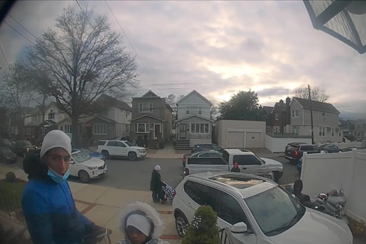 Security camera footage shows migrants soliciting homes in Brooklyn for financial help.