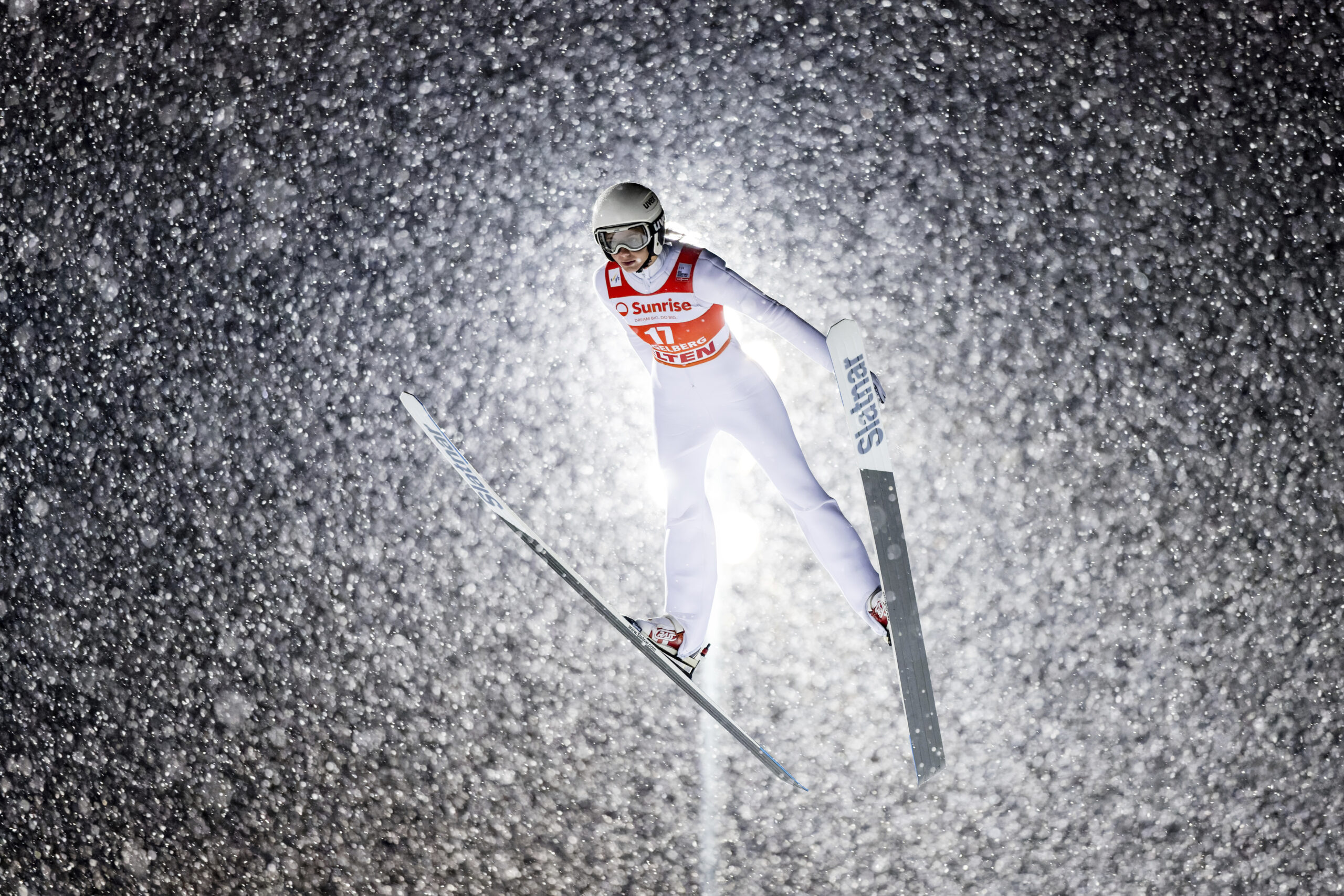 SWITZERLAND — A champion flies amid beautiful snowflakes: Daniela Haralambie of Romania competes during the qualification of the women's FIS Ski Jumping World Cup competition at the Gross-Titlis Schanze in Engelberg, Switzerland, Thursday, Dec. 14, 2023.Photo: Philipp Schmidli/Keystone via AP